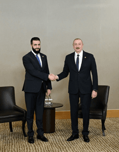 الشرع مع علييف.jpg