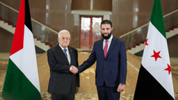 الشرع مع عباس.jpg
